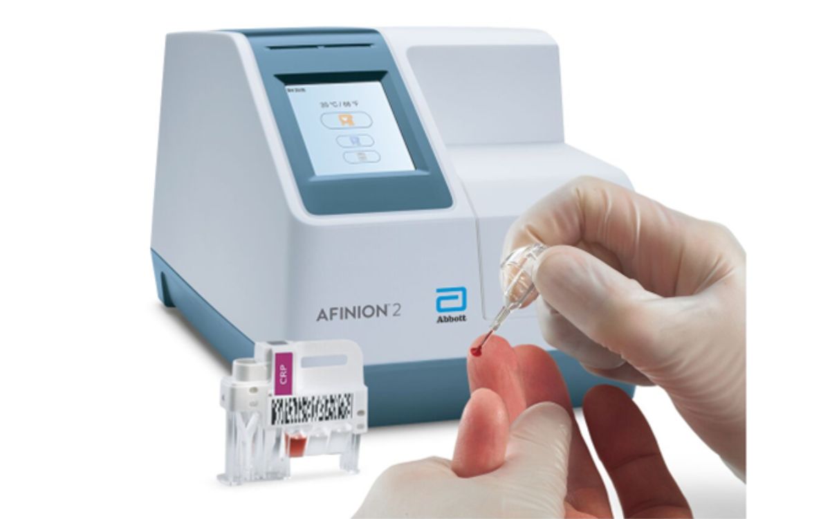 Abbott Afinion™ 2 Analyzer dan kartrid CRP.